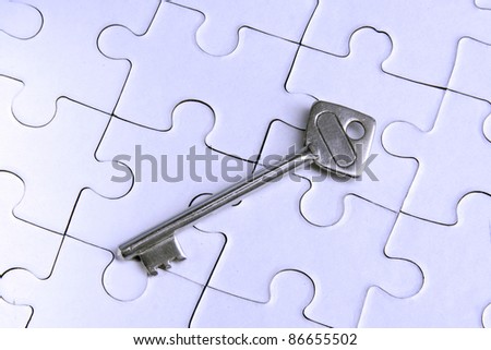 Key on jigsaw puzzle pieces