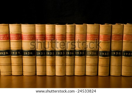 A row of old legal case reports.