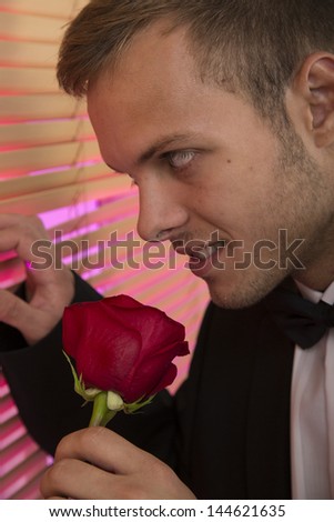 man with rose wait hes woman