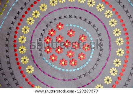 Spiral colorful flowers and embroidery