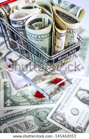 shopping trolley full dollar bill, greenback