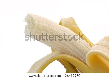 Ripe open banana isolated on white background