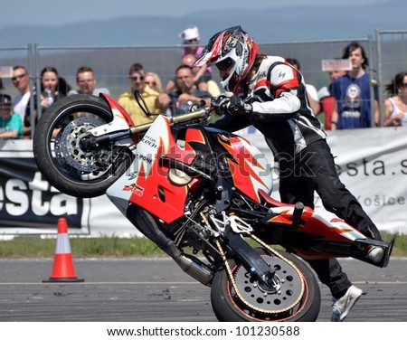 BOLKOVCE, SLOVAKIA - APRIL 28: Angyal ZoltÃ?Â¡n from Stunt show - Hungary performs stunt using motorcycle during the MAD POWER FEST, on April 28, 2012 in Bolkovce, Slovakia