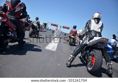 BOLKOVCE, SLOVAKIA - APRIL 28: Unidentified riders during the MAD POWER FEST 2012 1st. round of slovakian drag racing championship, on April 28, 2012 in Bolkovce, Slovakia
