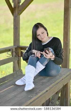 Close Up Of A Attractive Young Woman Speaking On Mobile Phone