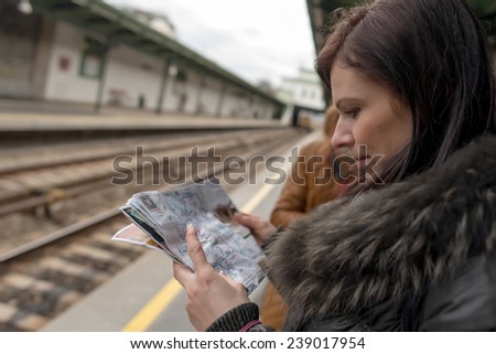 woman travelling with metro train