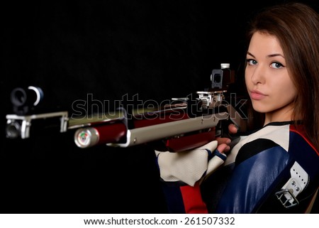 Woman with air rifle gun