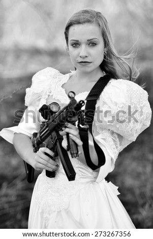 Beautiful woman with gun