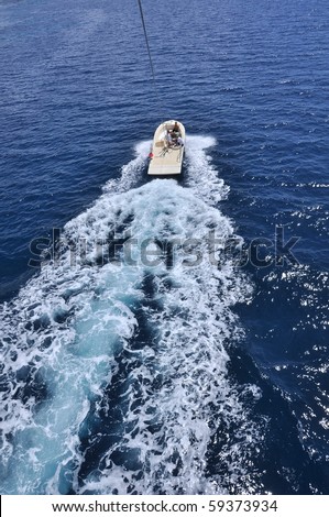 boat with splash and wake