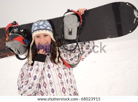 woman on snowboard