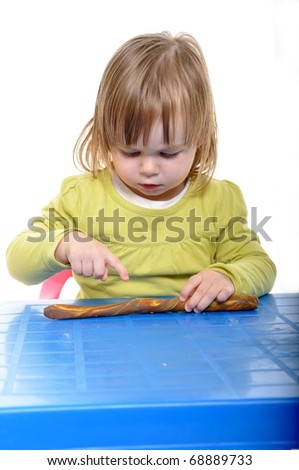 baby play with play dough