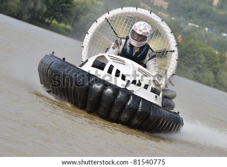 TRENCIN, SLOVAKIA - JULY 23: Klaus Bonighausen from Germany participate in the European championship hovercraft Laugaritio July 23, 2011 in Trencin, Slovakia.