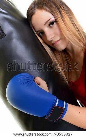 Young beautiful boxer woman with blue boxing gloves, close up, isolated on white, series photo