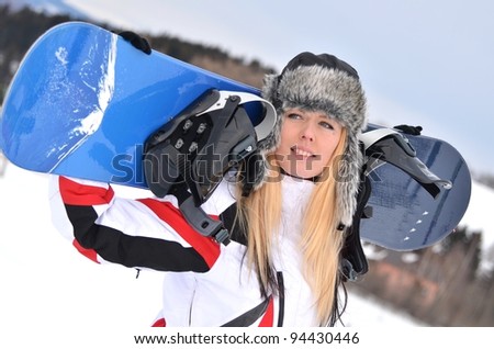 sexy blonde with snowboard
