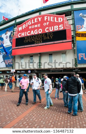 CHICAGO - APRIL 8: Chicago Cubs fans gather at Wrigley Field in Chicago for the 2013 Major League Baseball home opener on April 8, 2013.