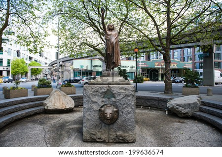 SEATTLE - MAY 10 - A statue of Chief Seattle stands in the center of Tilikum Place plaza in Seattle seen on May 10, 2014.