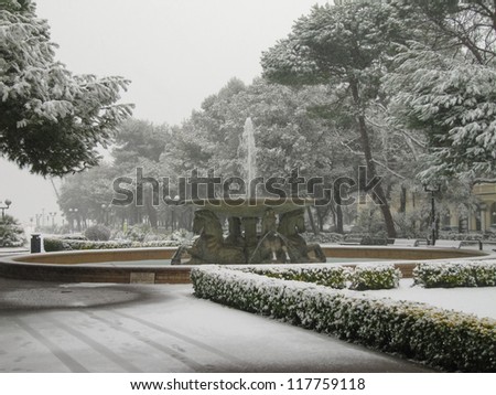 Fountain covered by snow, a really rare event in Rimini, Italy