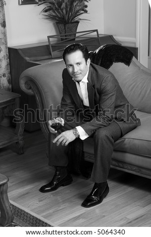 Men in formal with wine