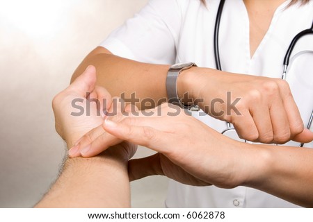 Hand checking for a radial pulse for a minute