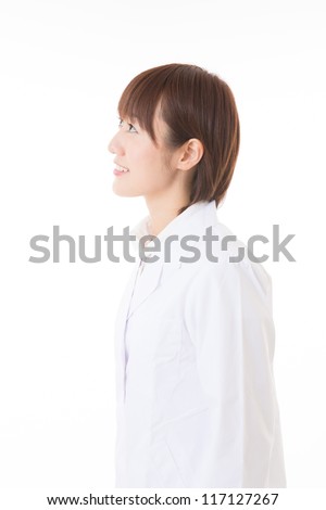 Young woman in a white coat