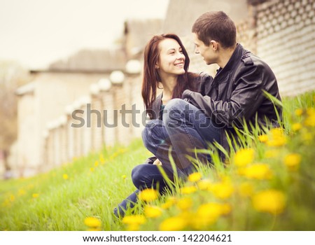 Happy Young Couple In Love Outdoor In Spring