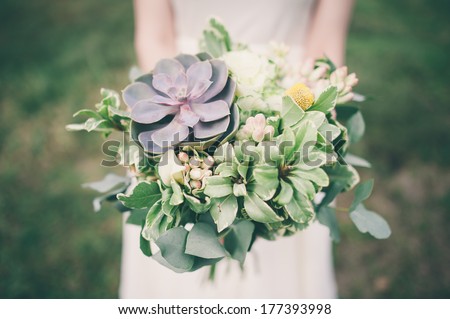 Bride Holding The Wedding Bouquet, With Succulent Flowers, Close-Up