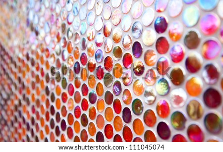 Orange and red round glass mosaic pattern
