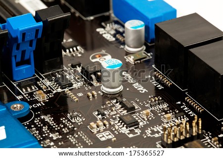 Laptop microchip and conductors on mother board close view