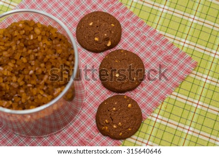 Round cookies and organic sugar bowl.