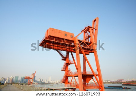 Wharf crane with the blue sky.It\'s very suit for wallpaper./wharf crane/wharf crane