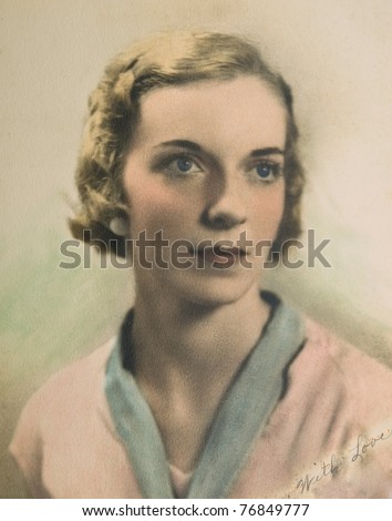 Vintage portrait of a woman on textured paper with a handwritten note to a loved one.