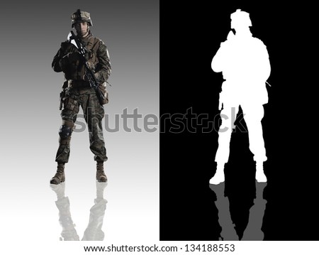 U.S. military marine. Studio shooting. With alpha channel. frontal pose with reflections.