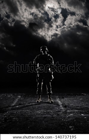 U.S. Marines At Dark. Military Night Under The Light Of The Moon.