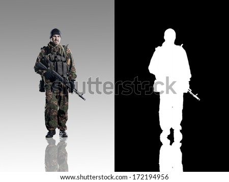 Russian troops. Studio shooting. With alpha channel. frontal pose. going. with reflections. isolated.