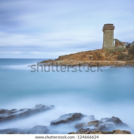 Calafuria Tower landmark on cliff rock and sea in winter. Tuscany, Italy, Europe