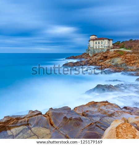 Boccale castle landmark on cliff rock and sea in winter. Tuscany, Italy, Europe