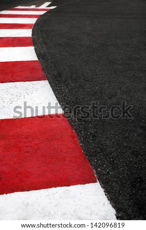 Motor race asphalt and curb on Monaco Montecarlo Grand Prix street circuit