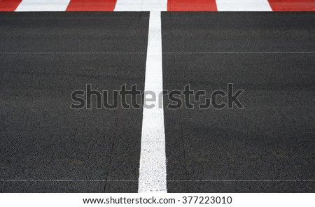 Start and Finish motor race line asphalt on Grand Prix street circuit