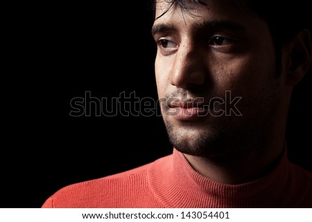 portrait of Indian man over dark background, Grains & textures are added