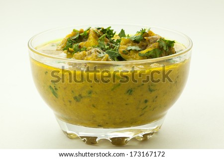 Food of potato or egg or meet garnish with fine chopped coriander