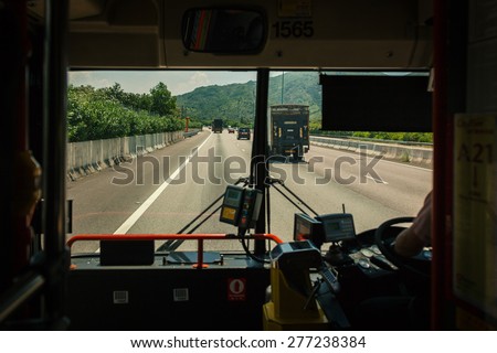 Beautiful view of the Lantau Road from front window of Airport Bus, The only road the connects Hong Kong and Lantau Island, Hong Kong (China), 19 June 2013