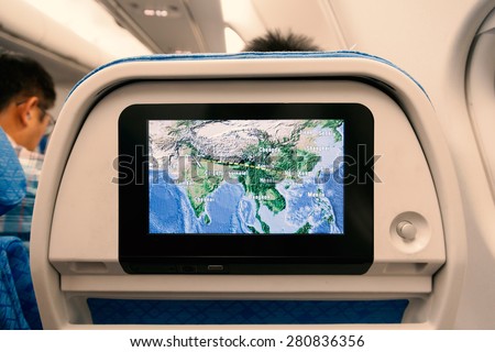 India to Hong Kong Flight Plan on LCD Screen of Economy Class of Cathay Pacific Airline. Interior of a Boeing airplane.
