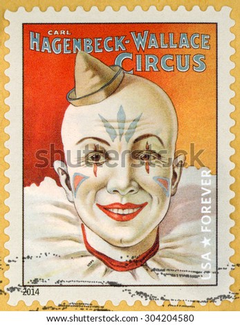 UNITED STATES - CIRCA 2014: forever stamp printed in USA (US) shows head of smiling clown with hat in his hand; Carl Hagenbeck-Wallace circus; circus vintage posters; circa 2014