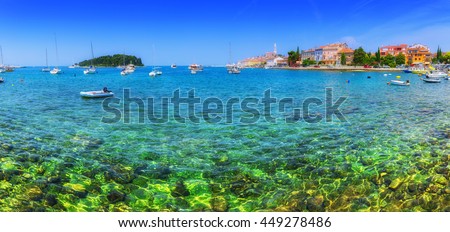 Wonderful romantic old town at Adriatic sea. Boats and yachts in harbor crystal clear turquoise water at magical summer. Rovinj. Istria. Croatia. Europe.