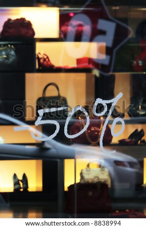 sale -50% in show-window
