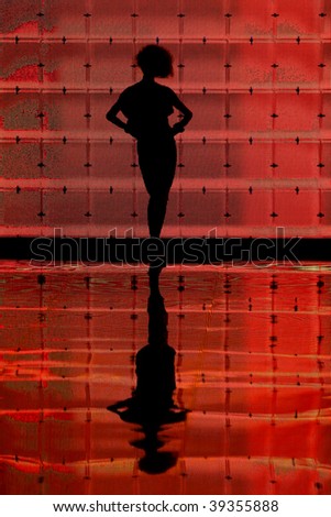 KIEV, UKRAINE - OCT 15: Silhouette of a model poses at the runway during Fashion Show by \