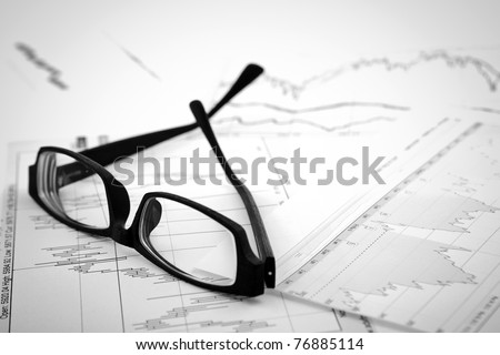 data analyzing in stock market: on the charts and quotes prints, the eyeglasses
