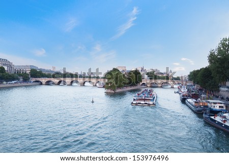 PARIS, FRANCE - July 21: View of the passenger ship on river Seine near to island Cite, on July 21, 2013 in Paris, France.