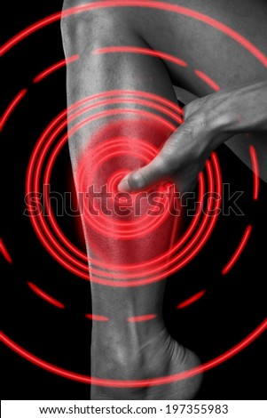 Pain in the female calf muscle, black and white image, pain area of red color