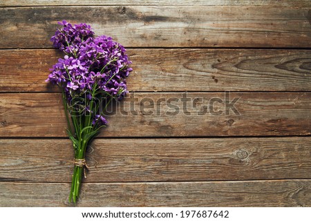 Bunch of willow-herb on wooden background